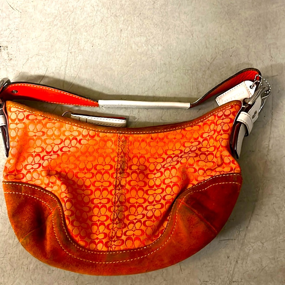 Little orange coach purse